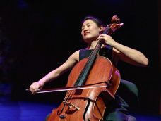 Woman playing on cello.