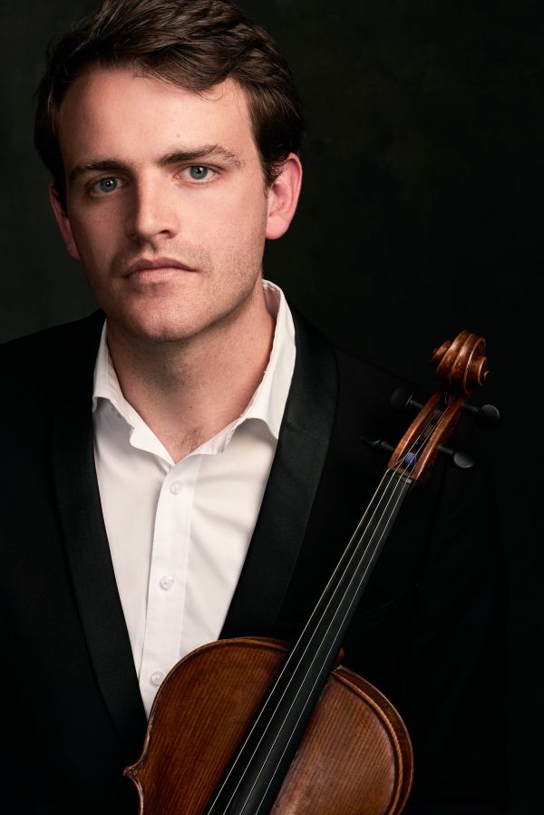 Man posing with viola.