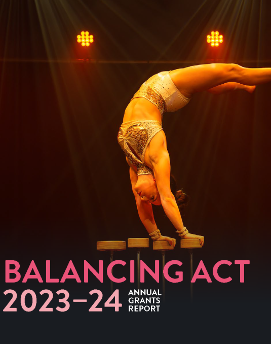 Woman handbalancing on a handbalance board.